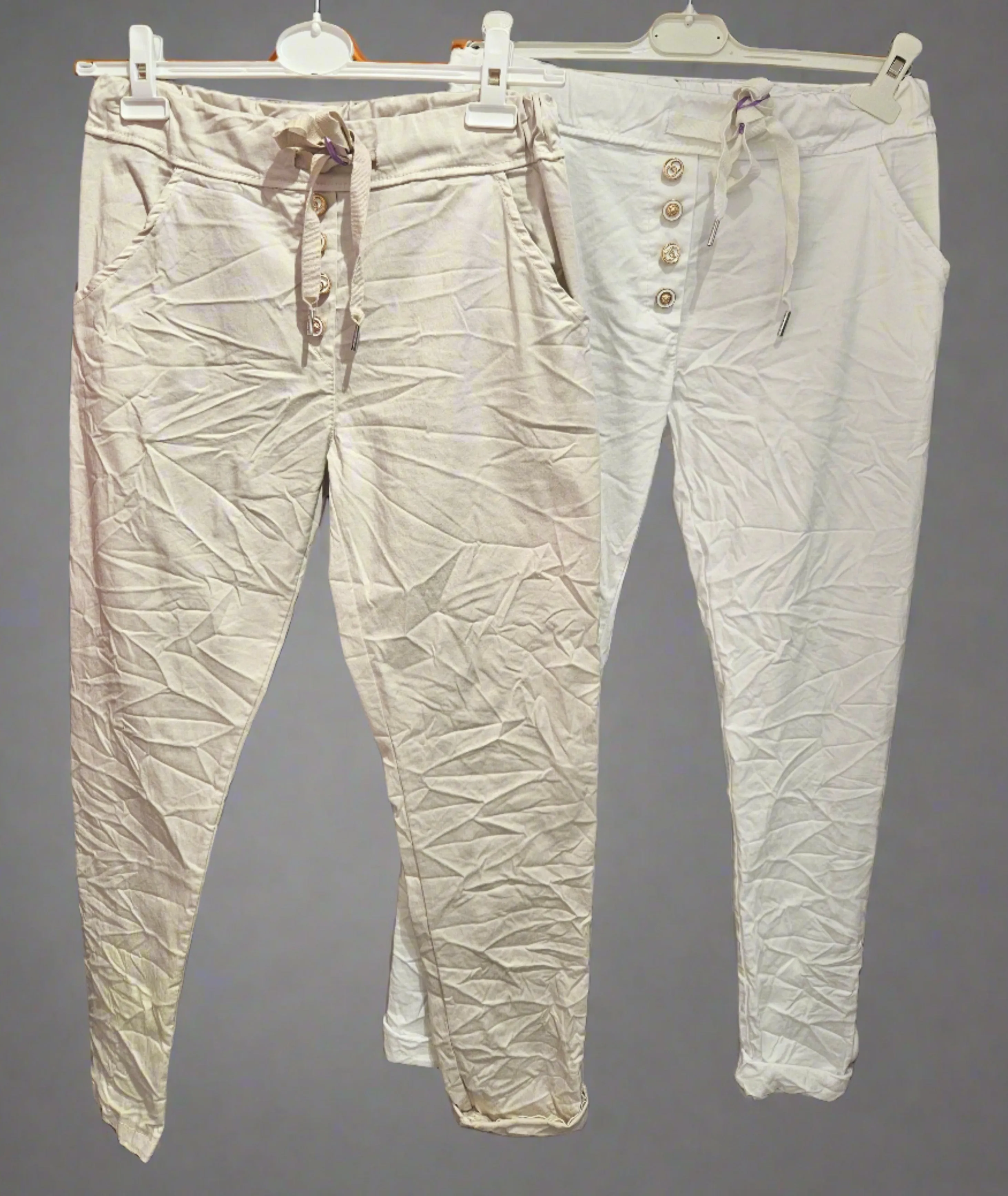 Joggers with drawstring waist and gold button detail